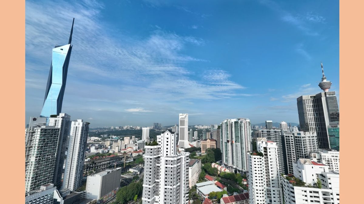 Actual site view photo showing Kuala Lumpur skyline from the Aloris plot